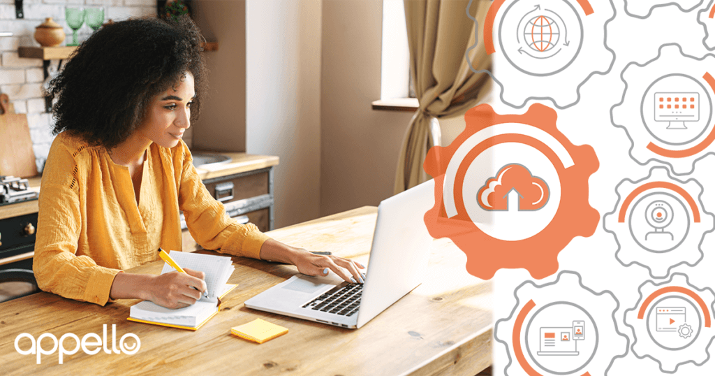 Woman working from home on laptop using Technology Enabled Care