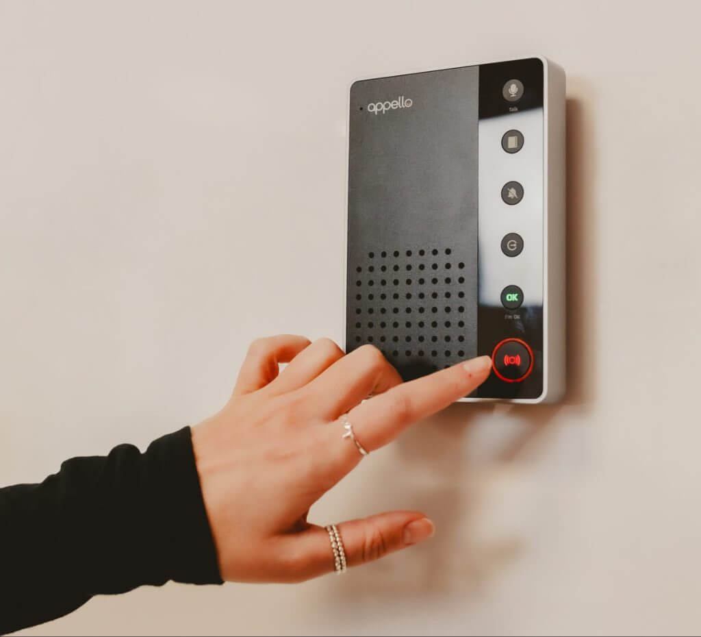 Elderly person using warden call system, SmartConnect unit